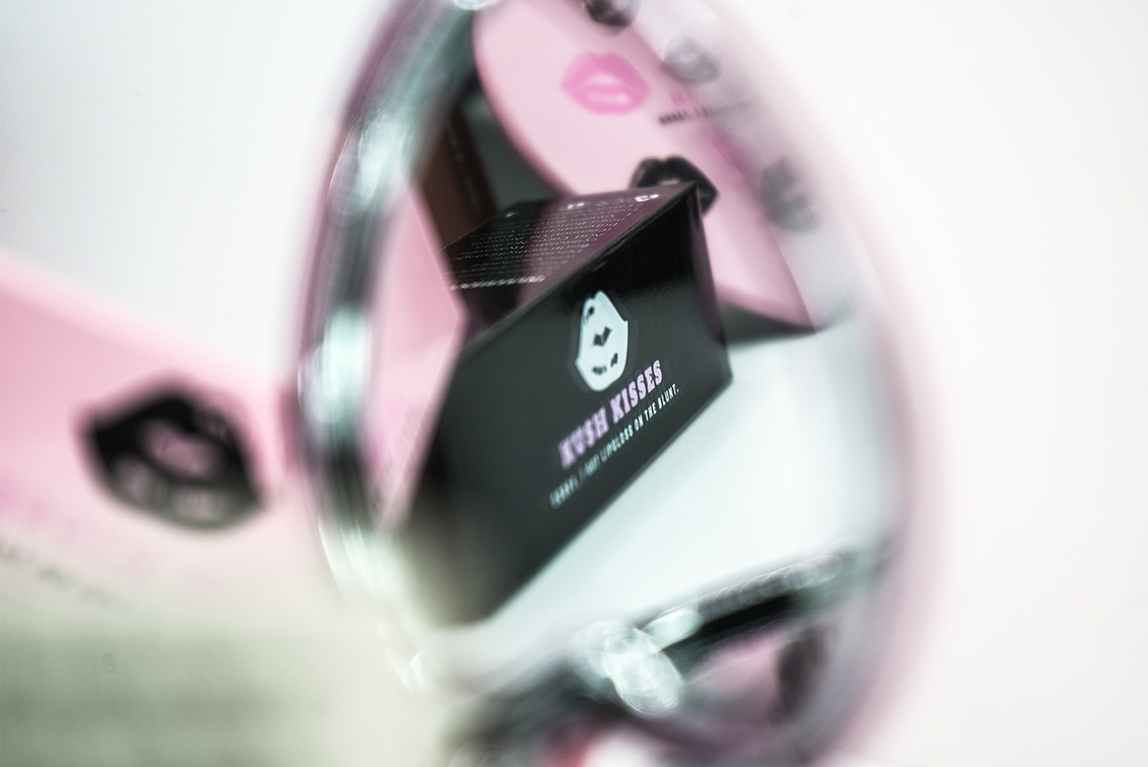 Original Kush Kisses gloss packaging and compact mirror